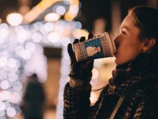 woman drinking tea: one of our healthy holiday snacks and treats
